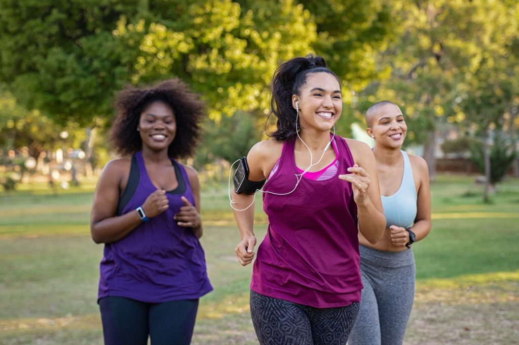 Happy women jogging
