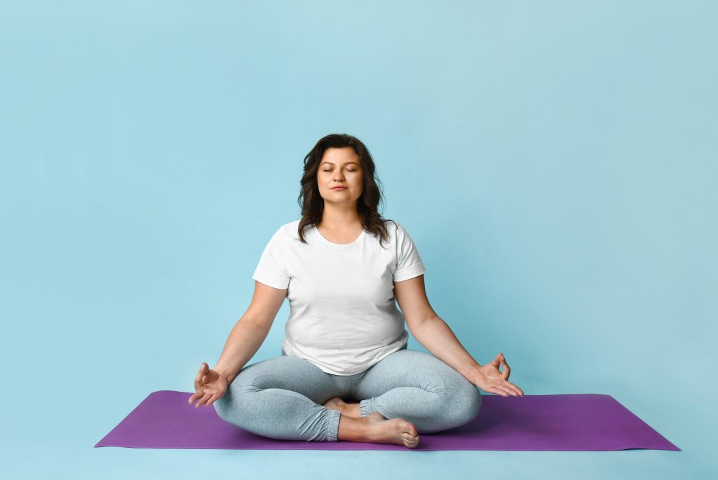 woman doing yoga at home