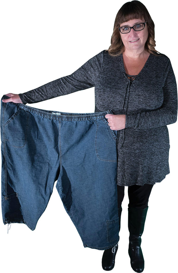 Denise holding large pants