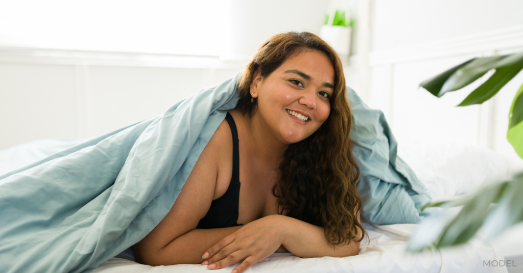 Beautiful woman resting in bed after gastric sleeve surgery